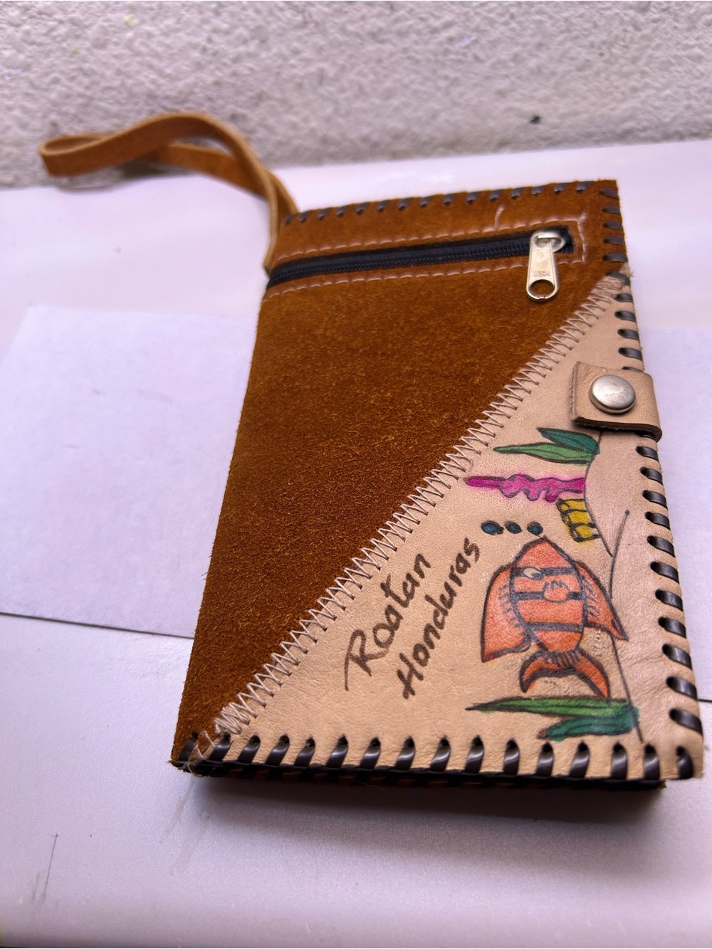 Handcrafted Brown Leather Wristlet Clutch with Artistic Fish Design